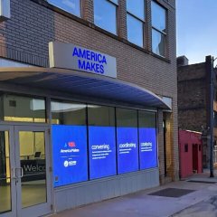 Photo of the America Makes building at sunrise