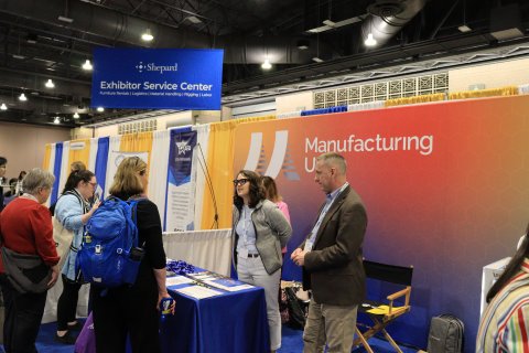 Manufacturing USA network representatives discuss programs with NSTA attendees.