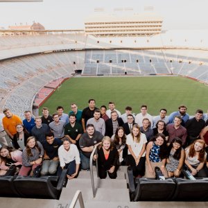 Photo of former IACMI interns at the University of Tennessee stadium