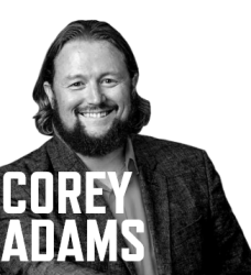 Photo of Corey Adams with his name in large white font