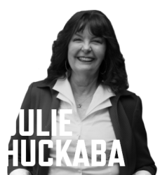 Photo of Julie Huckaba and her name in white font