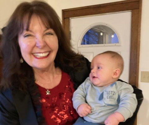 Photo of Julie Huckaba and her infant grandson