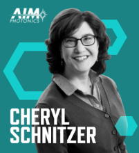 Graphic with a teal background, AIM Photonics logo, photo of Cheryl Schnitzer, and her name in white font