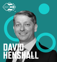 Graphic with a teal background, photo of David Henshall, his name in white font, and the SMART USA Logo
